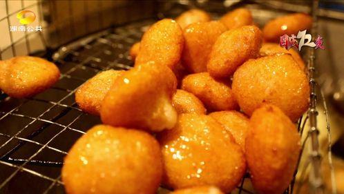 炸糖油粑粑的做法视频,传统美食制作全过程揭秘